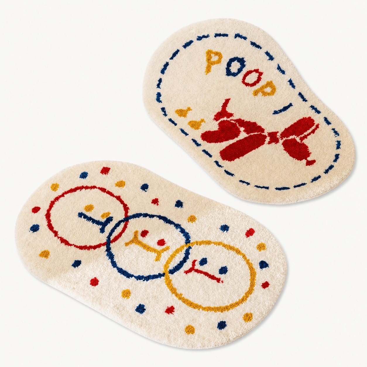 Set of two cream cartoon bath mats